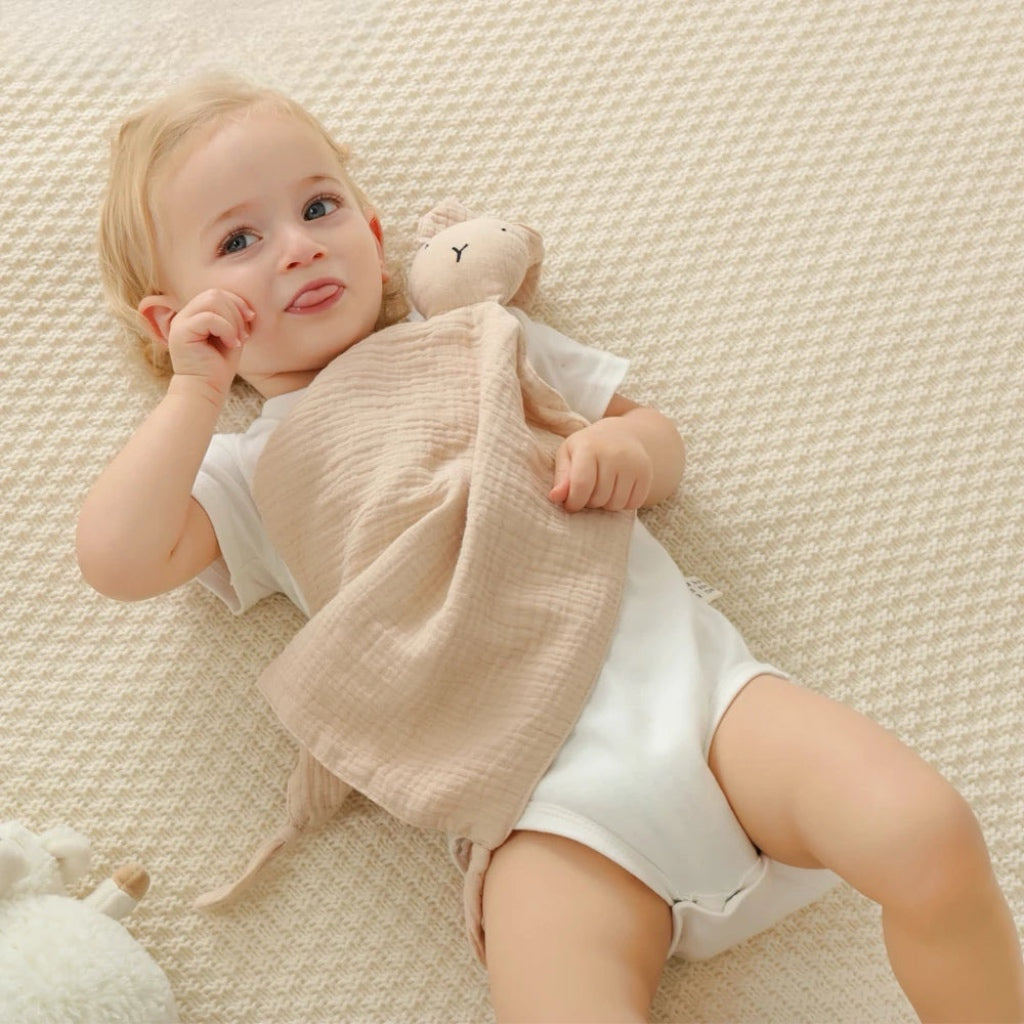 baby with bunny lovey